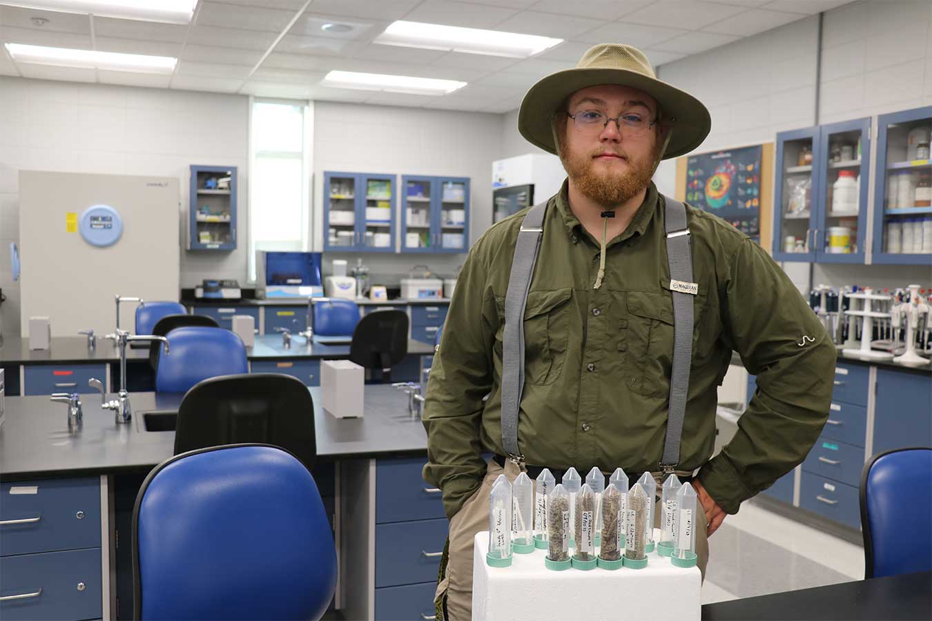 Adam Peak with his research samples.