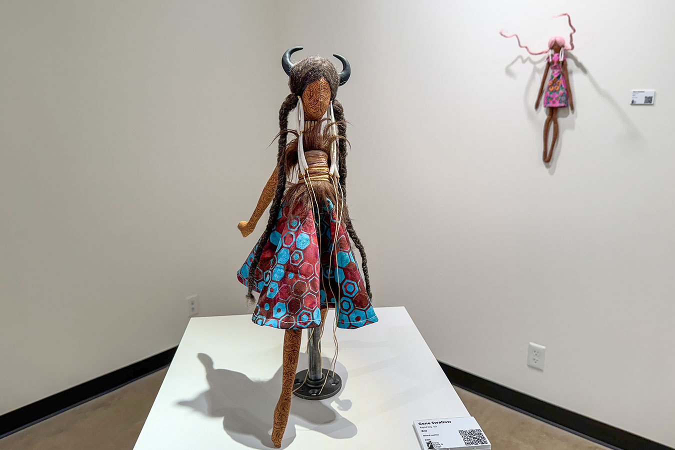 Gene Swallow's exhibition Modern Lakota featuring dolls he created is on display in the gallery at DSU through April 15.
