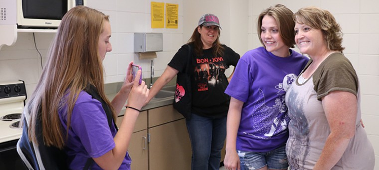 Cheryl Hovde and her daughter Maggie pose for a photo at the DSU GenCyber girls camp. 