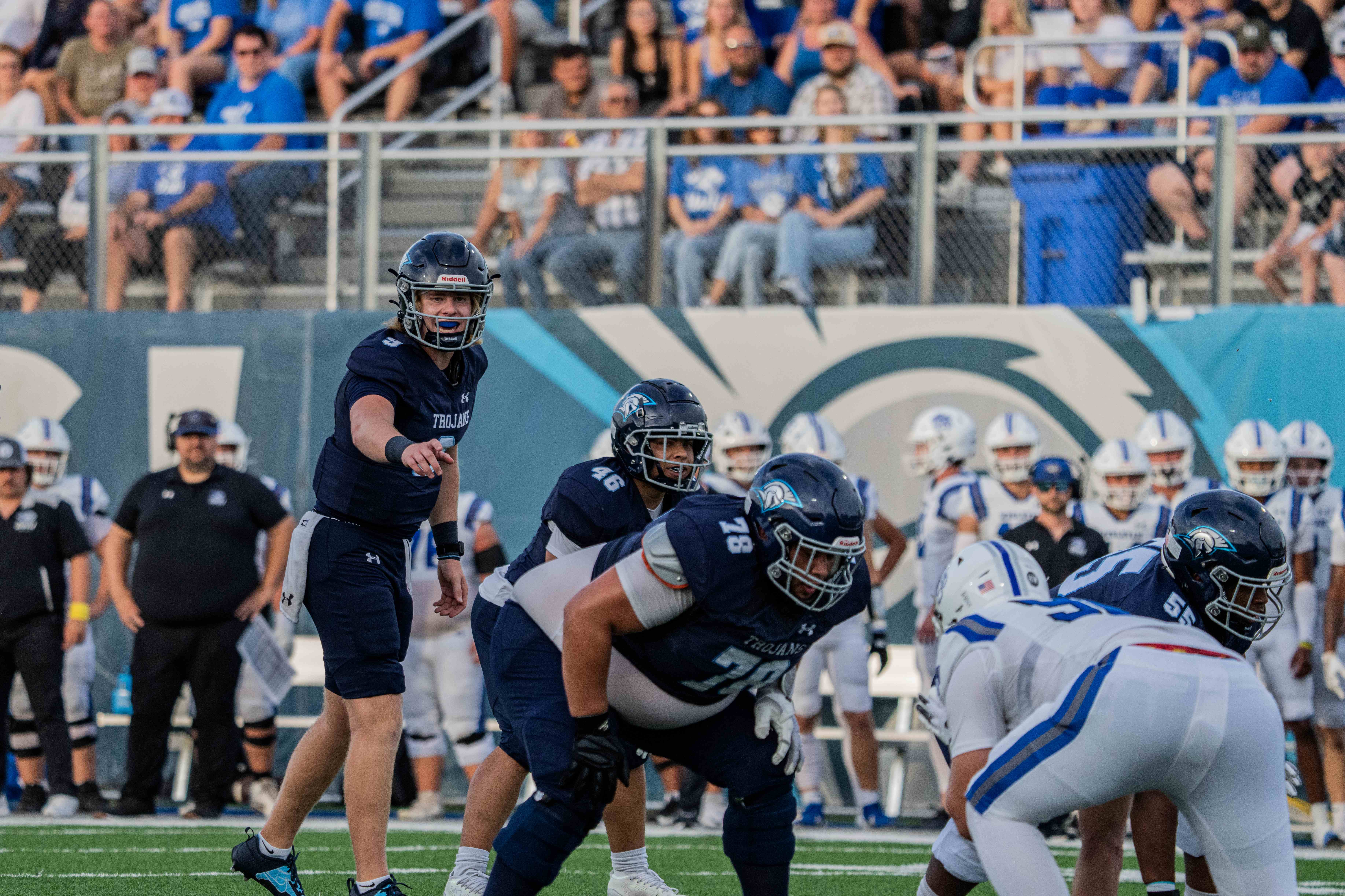 The DSU football team prepares to run a play.