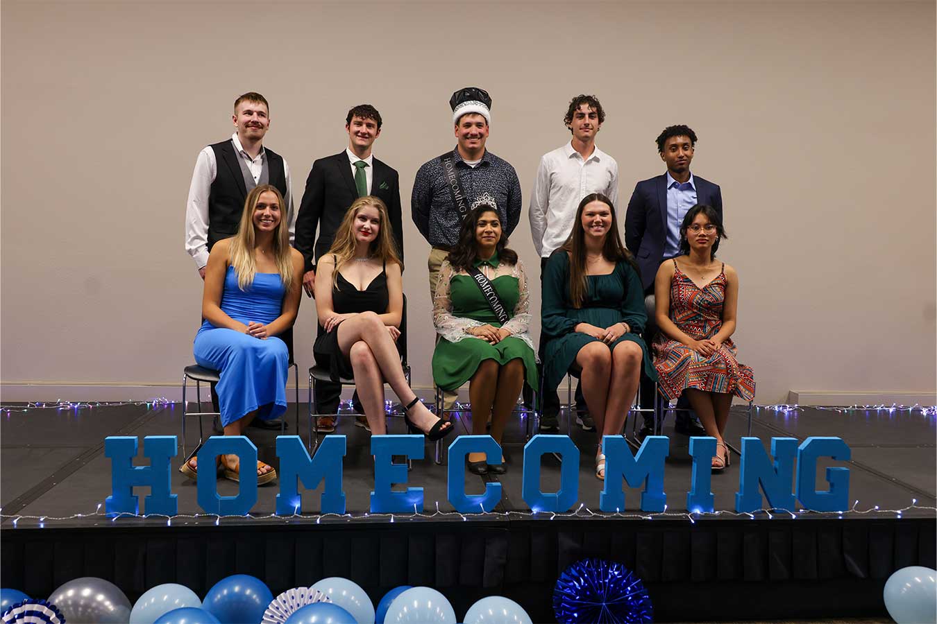 DSU Homecoming Court (pictured l-to-r): Back row: Kodiak McClure, Kaden Krusemark, Braxton Lacher, Cody Farland, and Wael Delessa. Front row: Angela Slattery, Jöelle Malacko, Maya Plummer, Hannah Evans, and Kinjal Basnet. 