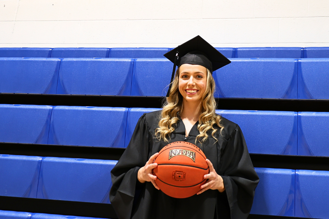 Angela Slattery, #21, found her place at DSU in the classroom and on the basketball court.