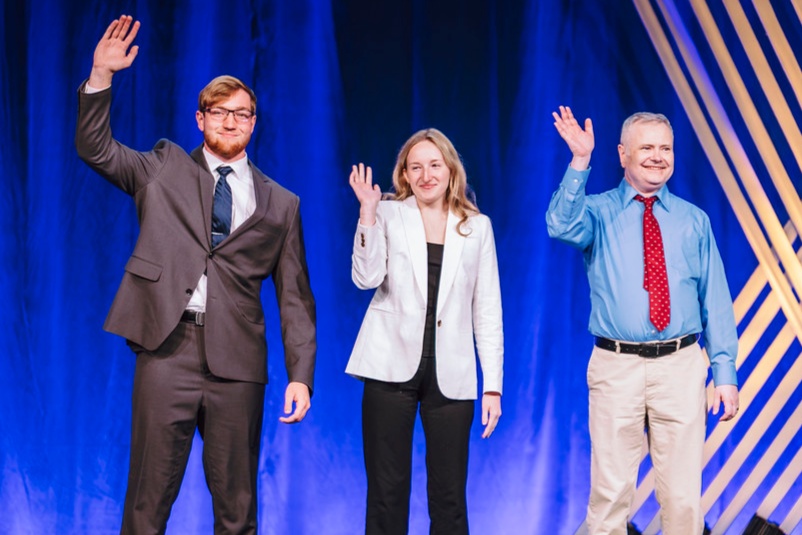 Tarin Bingham, Shelby Mennis, and Dr. Talley are recognized at the national FBLA conference.