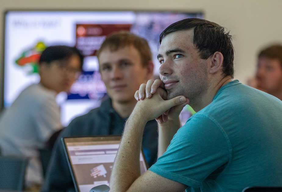 Smiling  DSU students in class