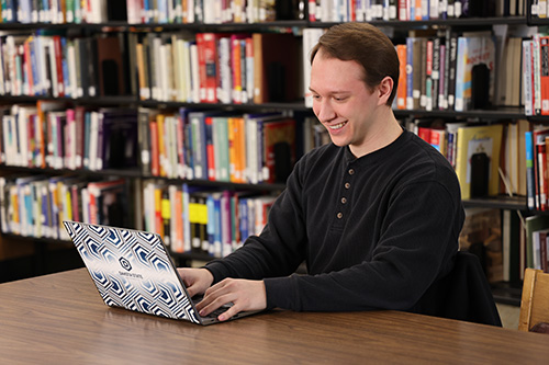 student on a computer