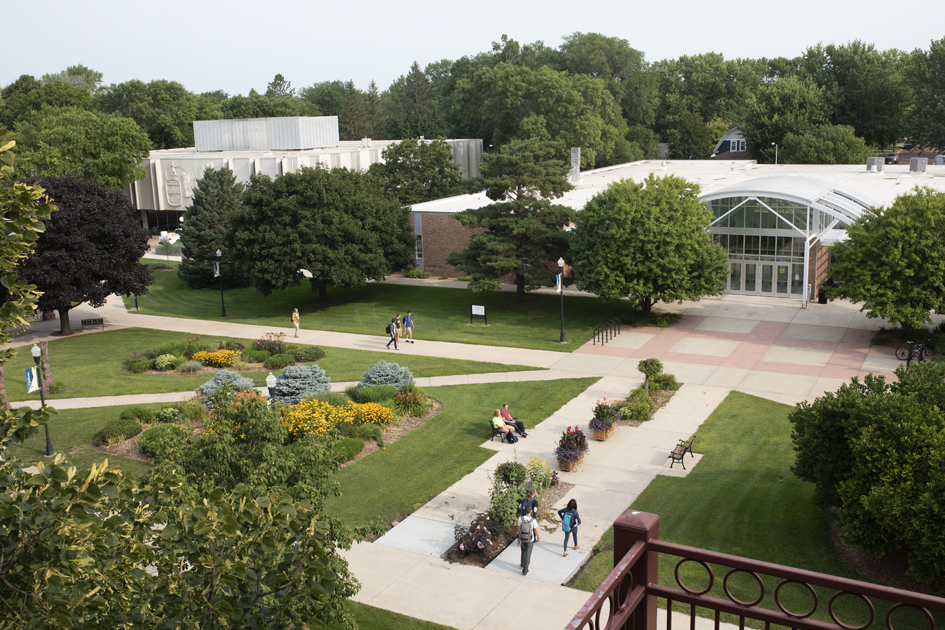 Picture of DSU campus with students walking on paths.