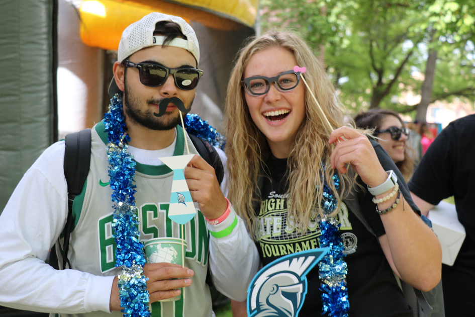 Students posing for photos at the annual Back2Blue Bash.