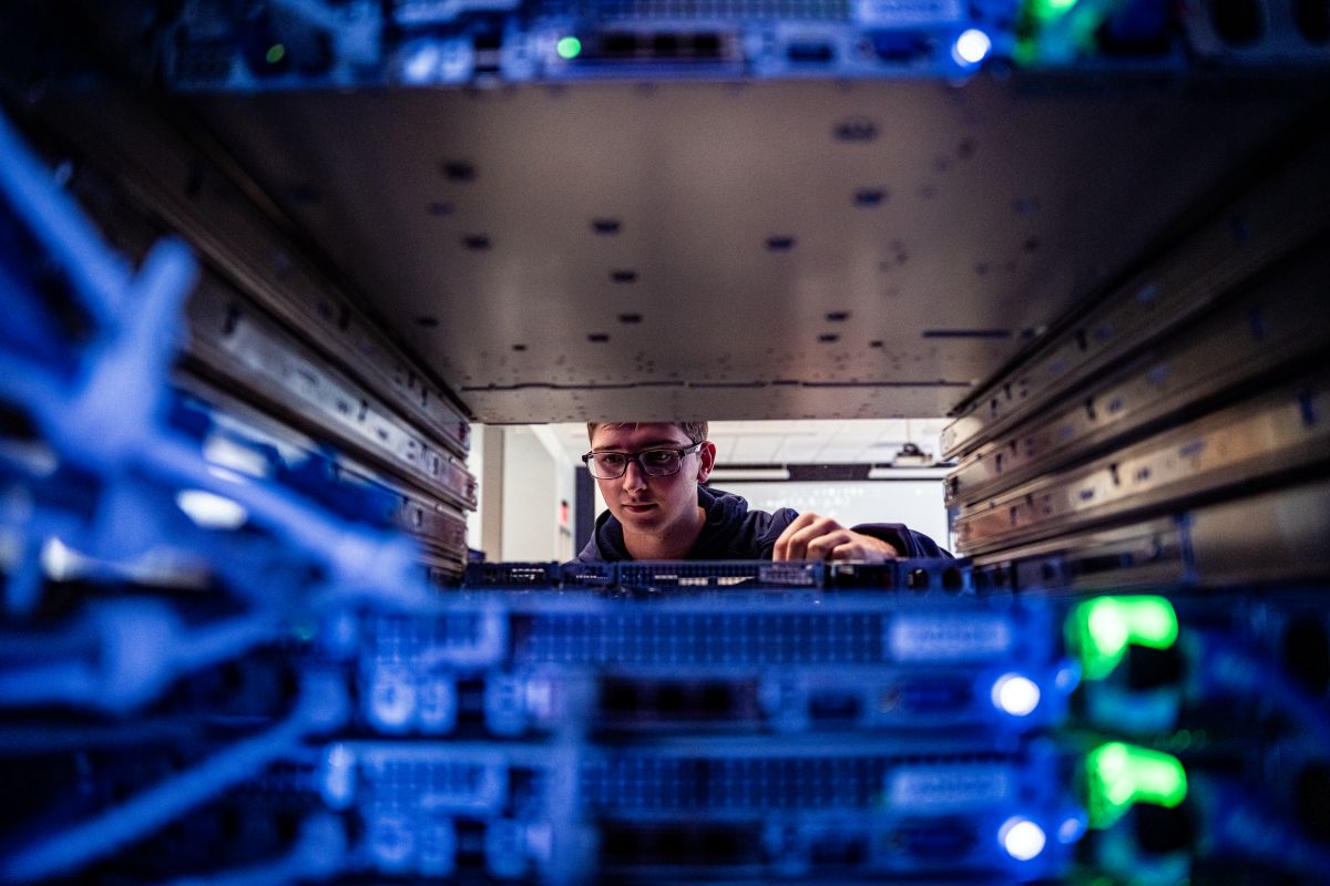 student working in server room