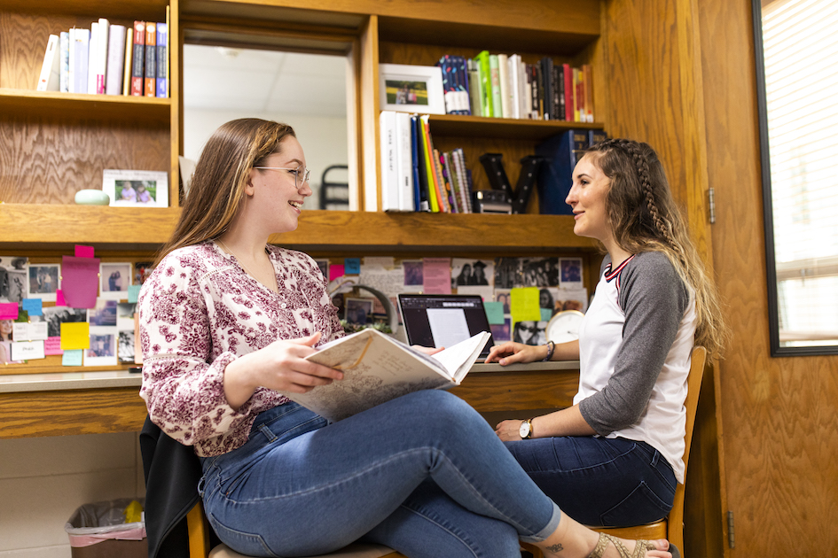 Students talking in dorm room