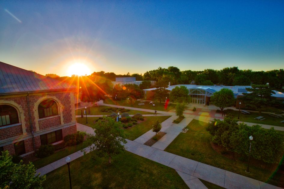 ariel shot of campus with sunset