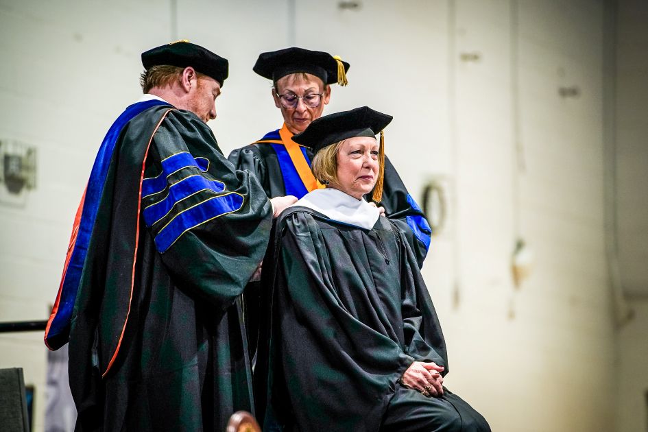 dsu student receiving doctorate degree at commencement