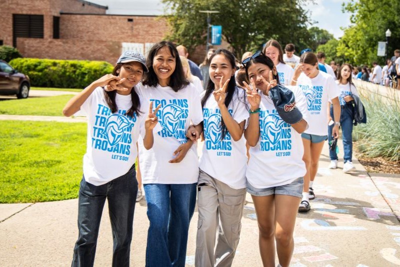 four dsu students posing for picture on move in day