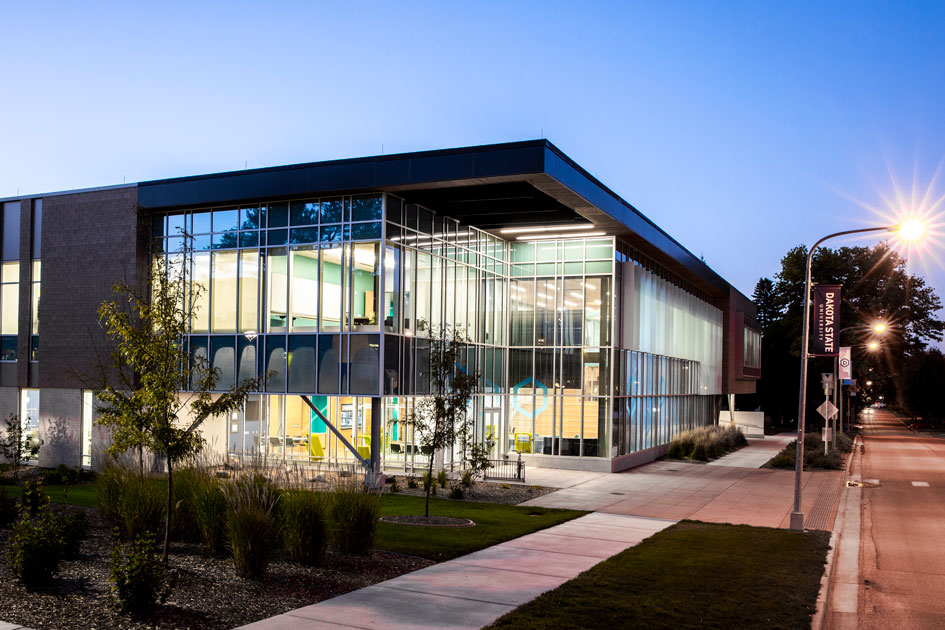 External image of The Beacom College of Computer and Cyber Sciences at dusk