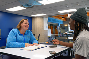 Dakota State University admissions staff counseling a student 