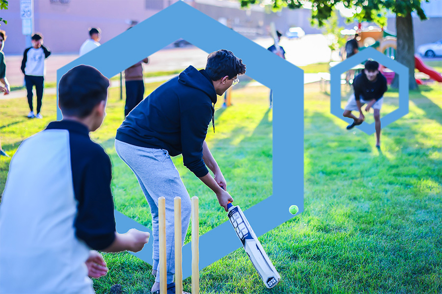 international students playing cricket