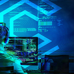 Governors Cyber Academy logo projected over a student and code