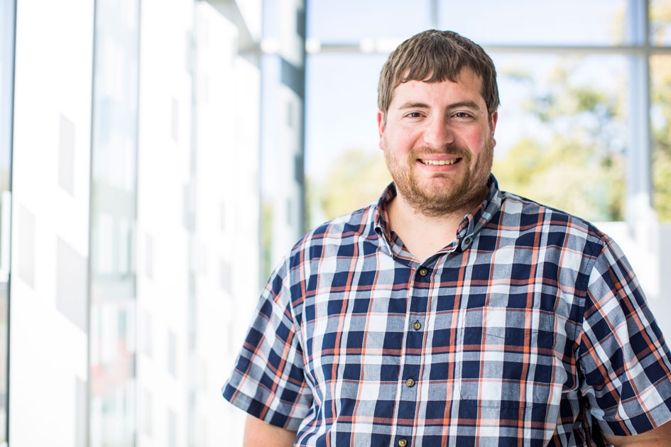 DSU student portrait taken in The Beacom College of Computer and Cyber Sciences building