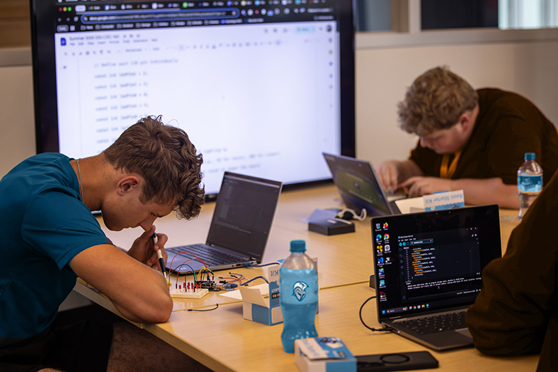 Two gencyber students working