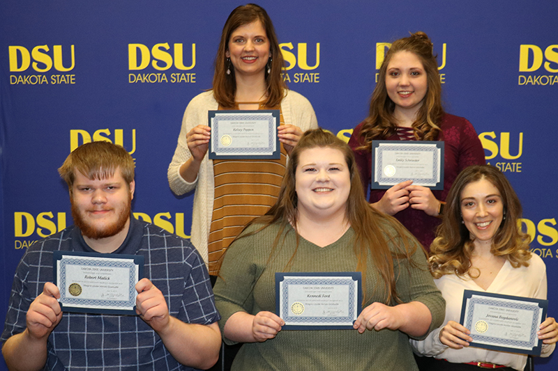 Baccalaureate students graduating with Magna Cum Laude academic honors (3.7 to 3.9 GPA) include: Kelsey Poppen (back left), Emily Schneider; Robert Malick (front left), Kennedi Ford, Jovana Bogdanovic.