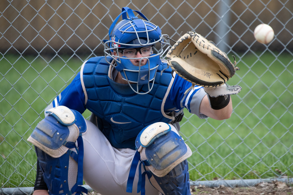 DSU Trojan baseball catcher in action