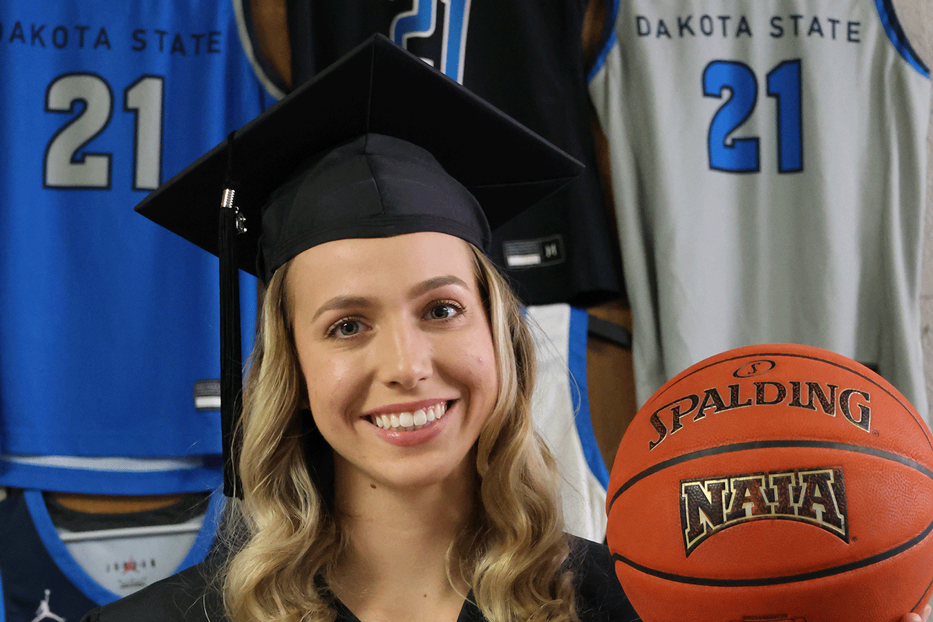 Angela Slattery, #21, found her place at DSU in the classroom and on the basketball court.