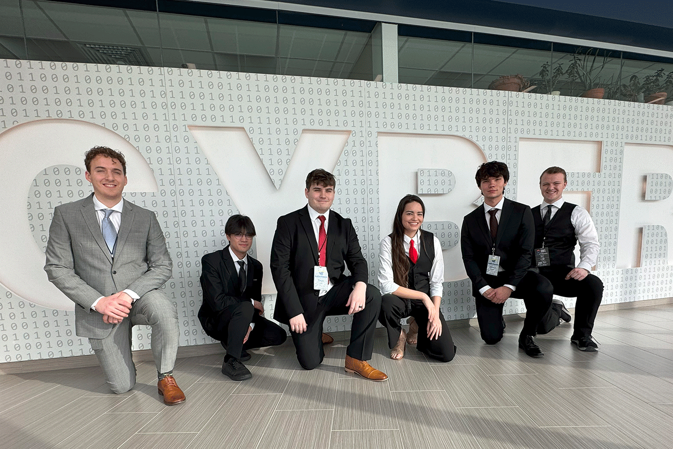 The winning DSU team at the global Collegiate Pen Testing Competition, Merrill Newman, Hunter Wade, Derek Manzella, Gwen Vongkasemsiri, Ryan Kleffman, and Rayn Light.