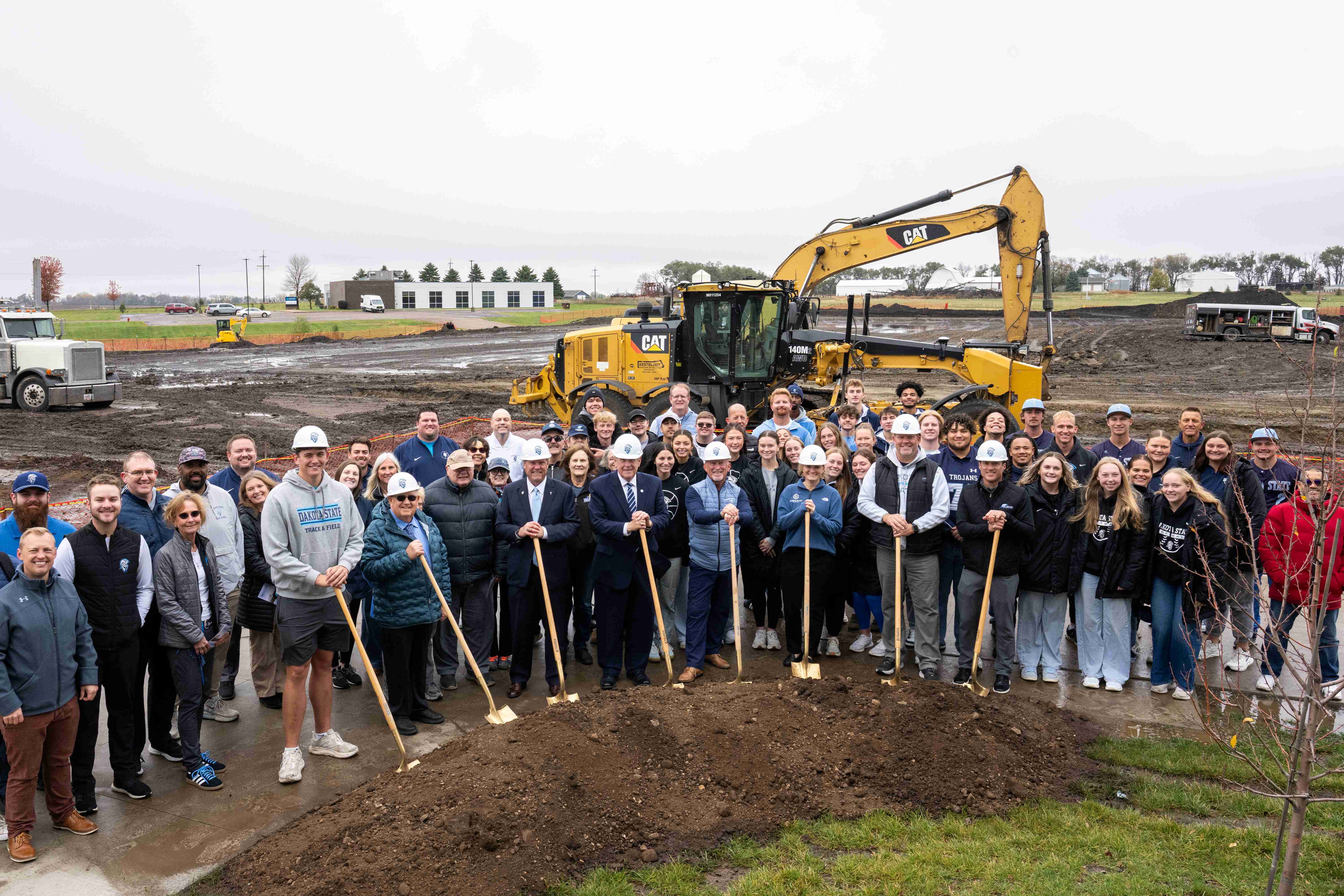 DSU students, alumni and leadership take part in a groundbreaking ceremony.