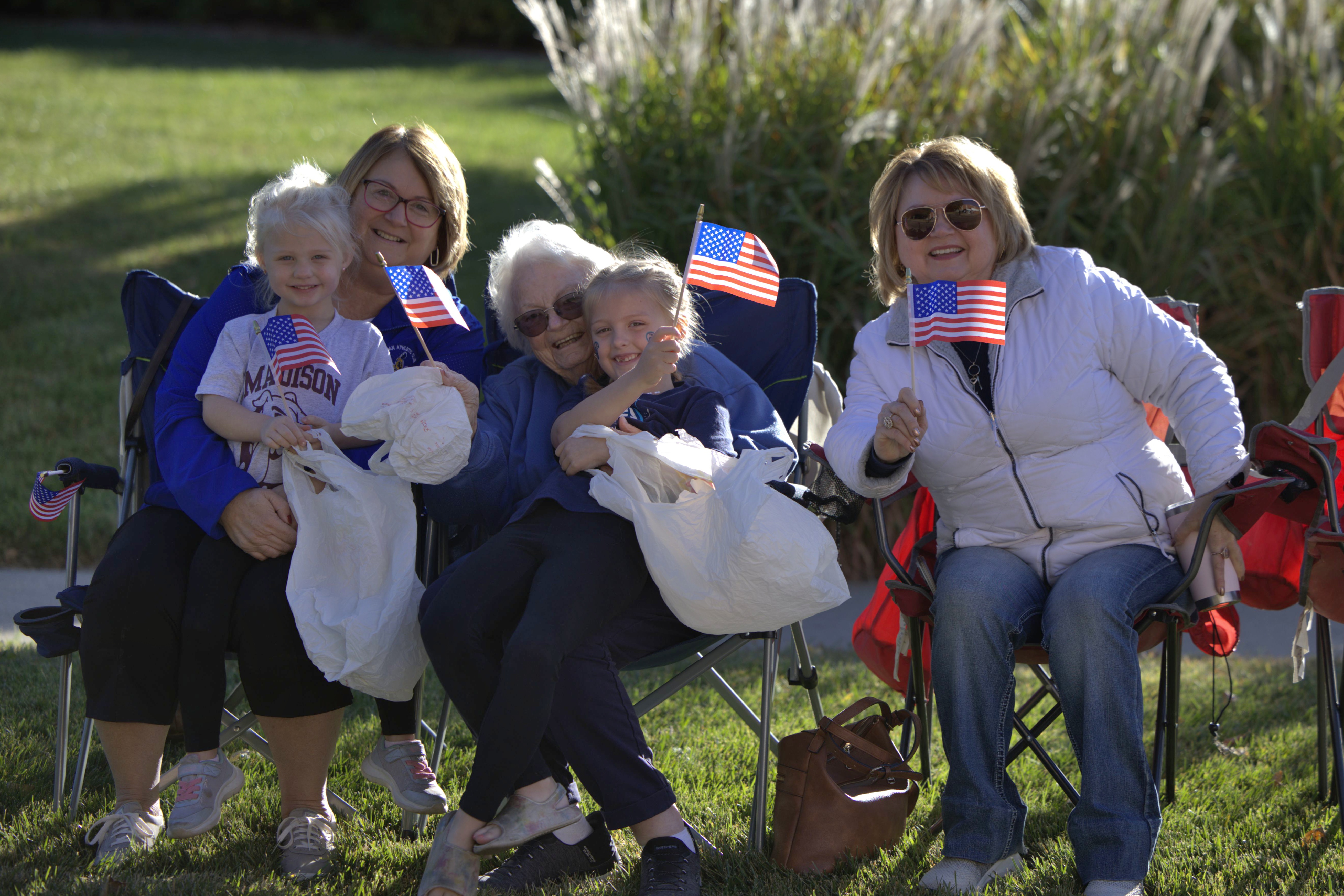 Madison residents enjoy the Homecoming parade.