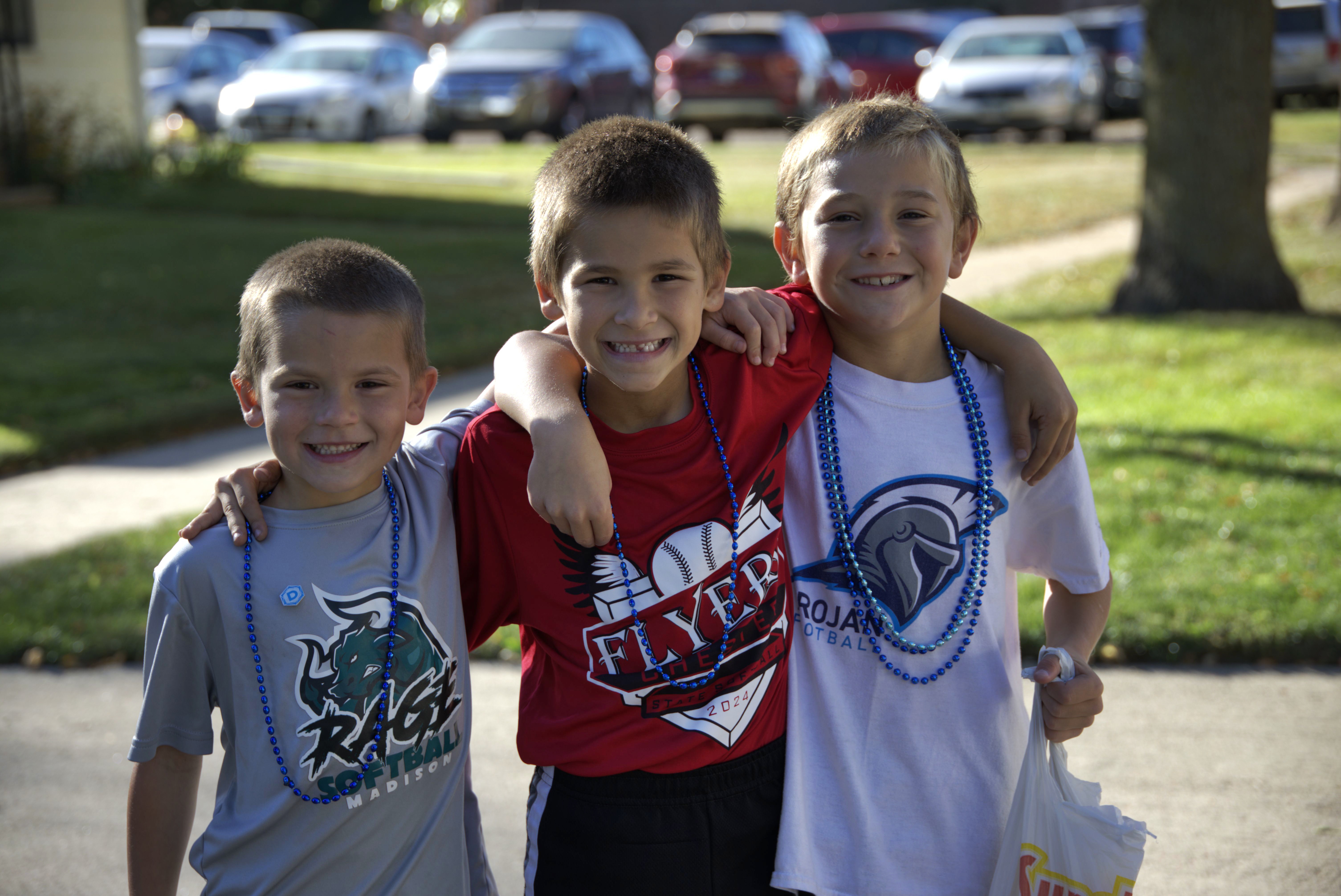 Madison residents enjoy the homecoming parade.