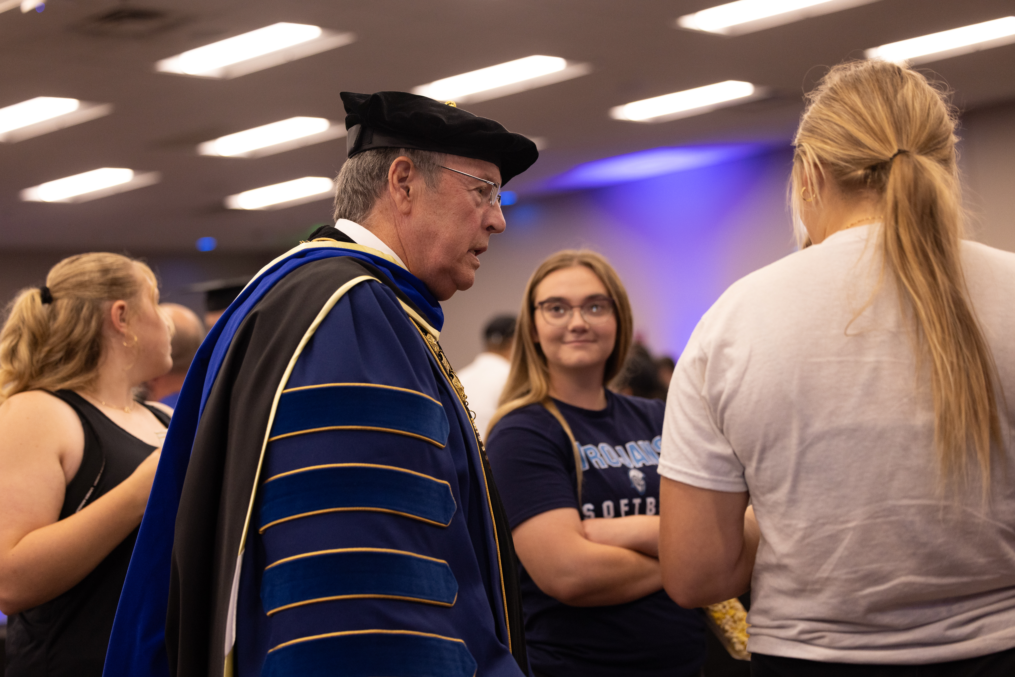 President Ballard speaks with some students from the Class of 2030. 