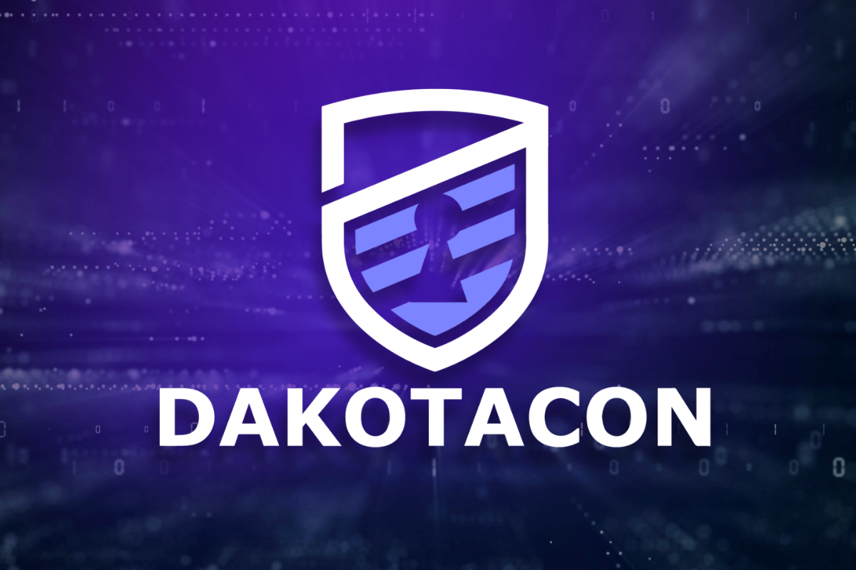White DakotaCon Conference Logo on purple and black background