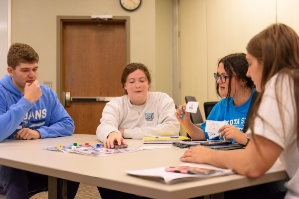 Four DSU Education students taking part in classroom exercises