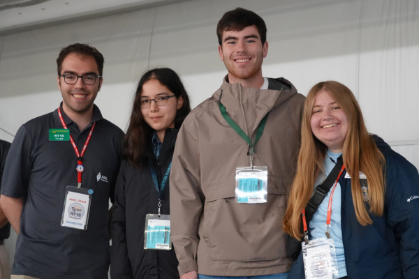 Tyler Schroder (left) stands with scholarship winners at Hamvention