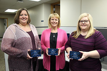 Controller Amy Dockendorf, Assistant Controller Kristi Voss, and Senior Accountant Ashley Jensen