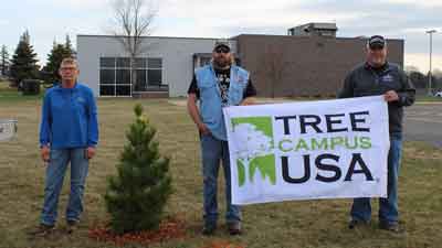 DSU Facilities Management employees Dian Doblar, Brent Peterson, and Andrew Schaefers celebrated Arbor Day on April 24 by planting this Swiss Stone pine, one of five new trees on campus near the Heartland Technology Center. DSU has been named a Tree Campus USA for four years in a row. 