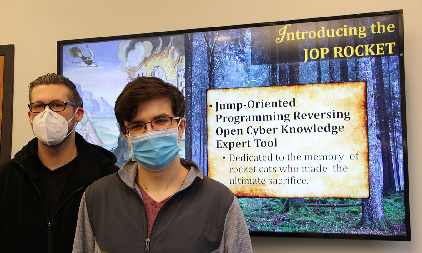 Dr. Bramwell Brizendine (left) and Austin Babcock will be presenting research on jump-oriented programming at two international conferences in May. 