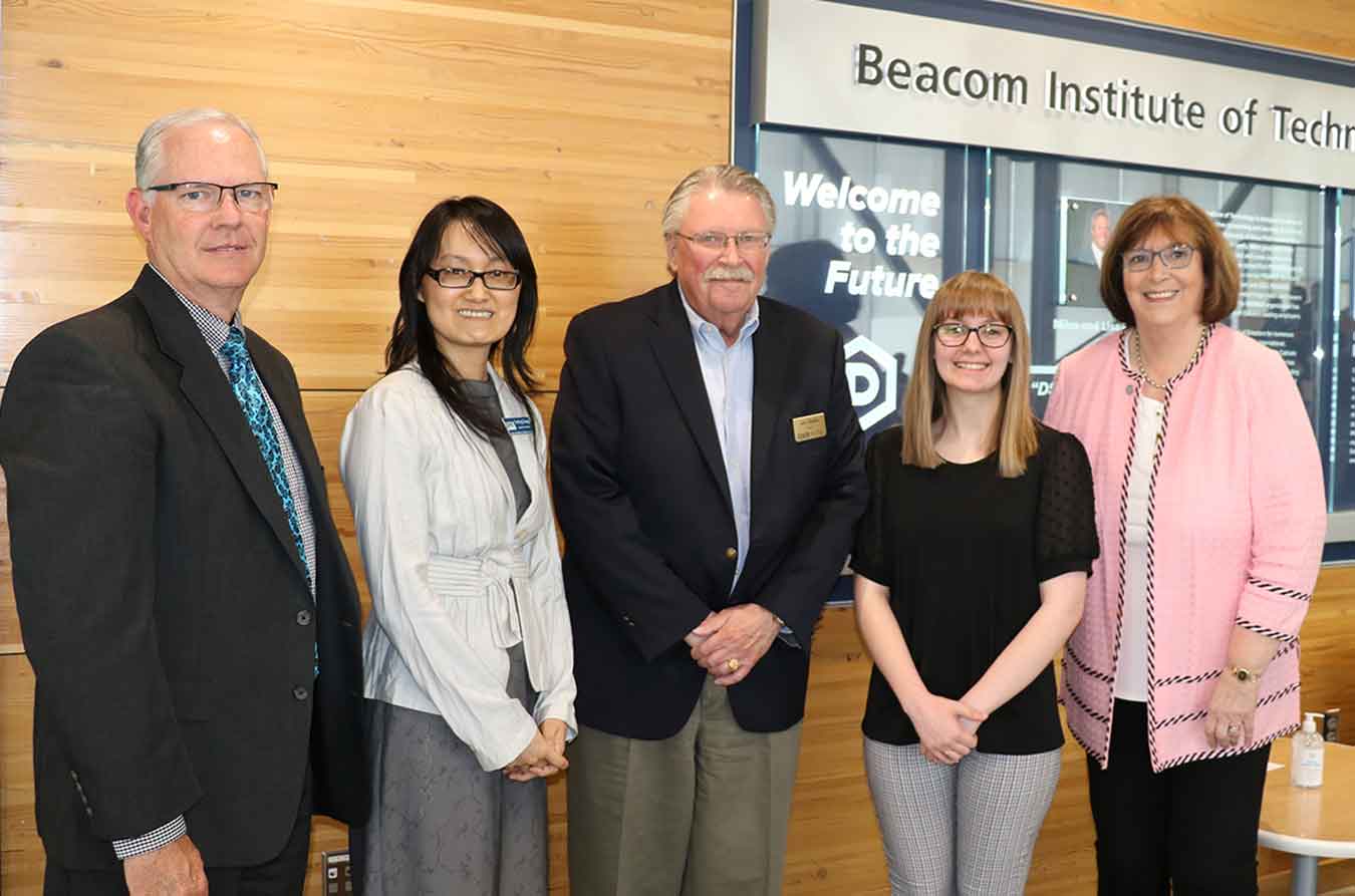 BOR Executive Director Brian Maher, Advisor Dr. Yen-Ling Chang, BOR President John Bastian, Student Madelin Smith, and DSU President José-Marie Griffiths