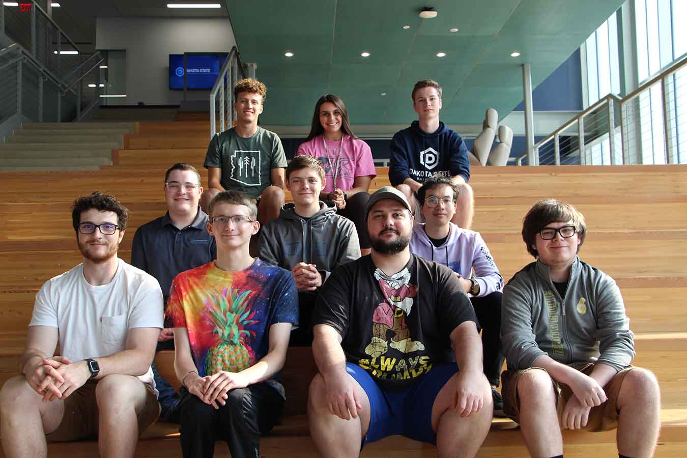 DSU’s 2021-2022 CyberCorps cohort: Evan Slominski (back left), Janessa Palmieri, Jacob Hince; Nathan Ord (row two, left) Austen King, Chirawat Yooyuenyong; Gib Elder (front left), Nick Sandison, Evan Watson, Ethan Havard. Not pictured, Nicholas Handberg.