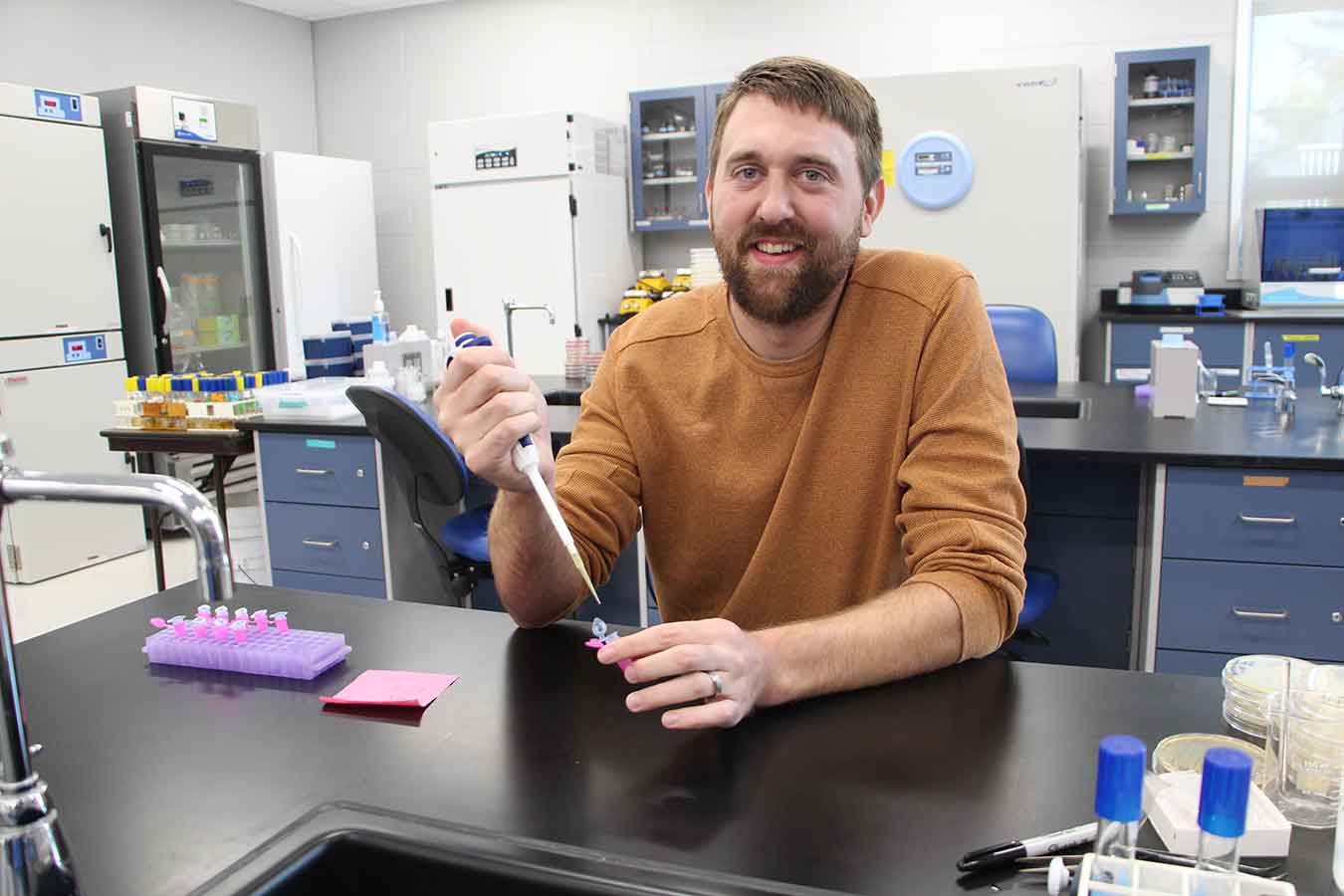 Faculty working in the research lab