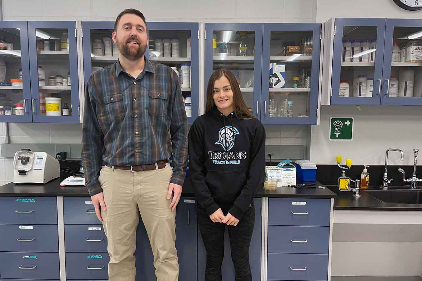 Dr. Andrew Sathoff (left) is mentoring Jenni Giles through her alfalfa research.