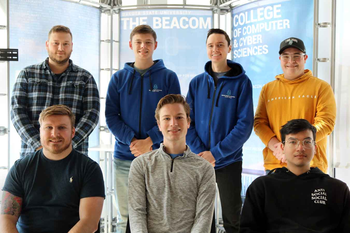 DSU’s CPTC team qualifies for the global championship in January. Team members include: Faculty Coach Tyler Flaagan (back left), Austen King, Shane Donahue, Nathan Ord; Cody Mayer (front left), Jacob Hince, and Chirawat “Kim” Yooyuenyong.