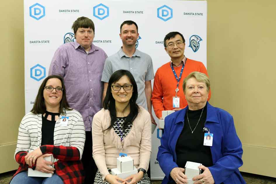 DSU employees with 10 years of service who attended the March 2 Longevity Reception include: Jason Jenkins (back left), Austin Slaughter, Yong Wang; Erin Blankespoor (front left), Yen-Ling Chang, Kay Schmidt. Not pictured: Joshua Stroschein.