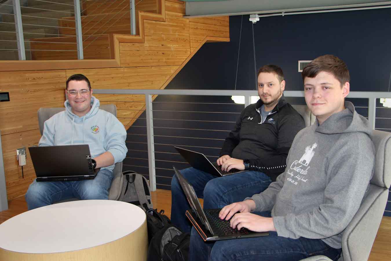 Austen King and Nathan Ord are learning about the research process, with help from faculty mentor Dr. Tyler Flaagan.