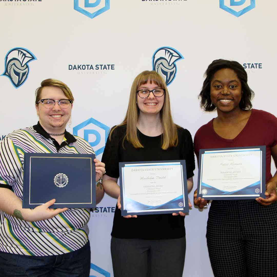 Accepting Regental Awards for student clubs are: Vincent Campbell (left), for The Alliance Club; Madelin Smith for PBL Club; Madelin Smith and Ketia Hanson for Photography Club. 