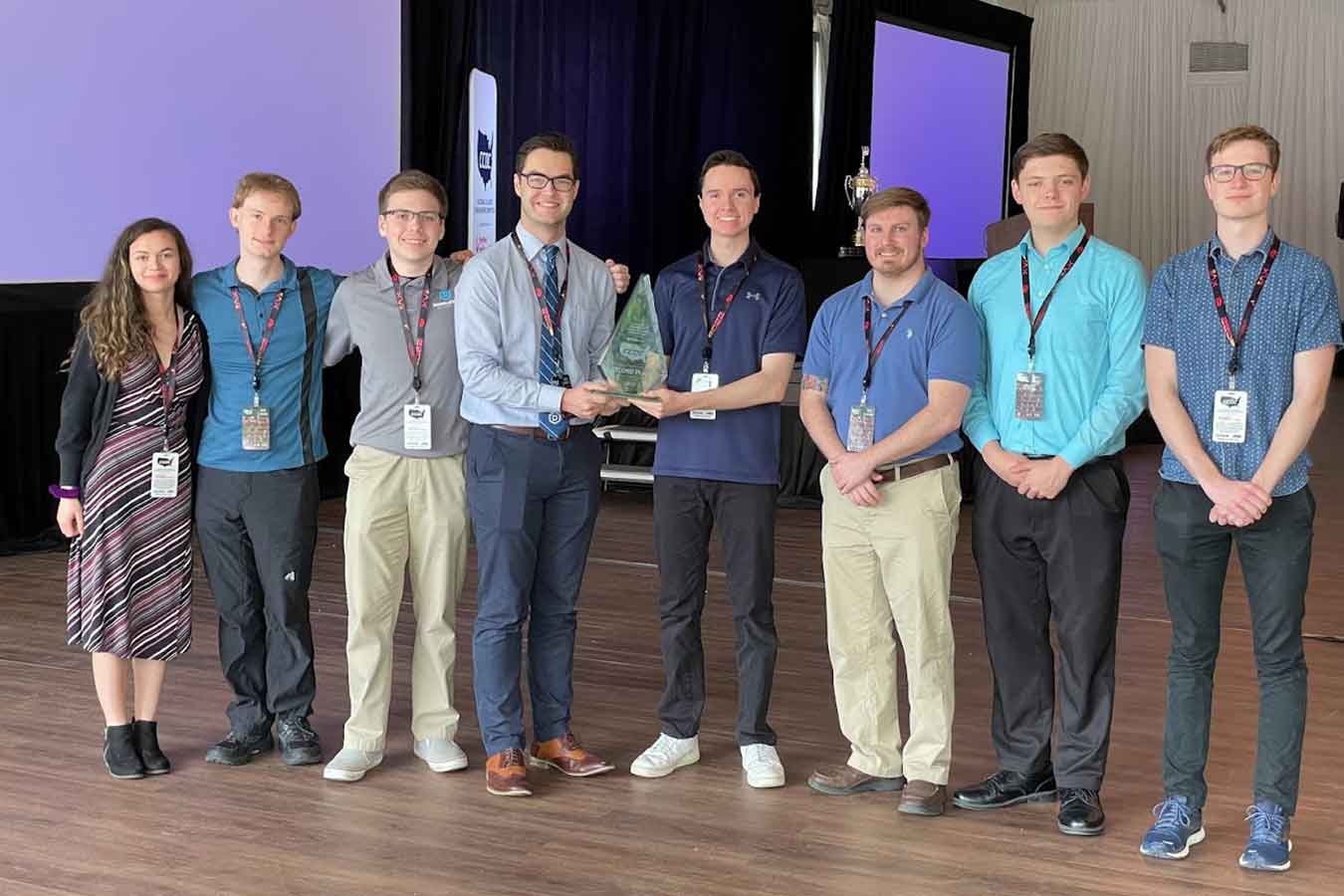 A team from DSU placed second in the NCCDC in April. Team members include Annabelle Klosterman (left), Gaelin Shupe, Tyler Thomas, Jackson Heiberger, Shane Donahue, Cody Mayer, Austen King, and Jacob Hince. 