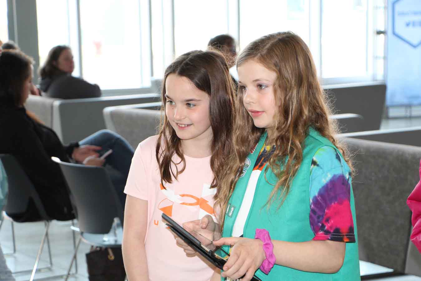 Girl Scouts from the Madison community working on a STEM project.