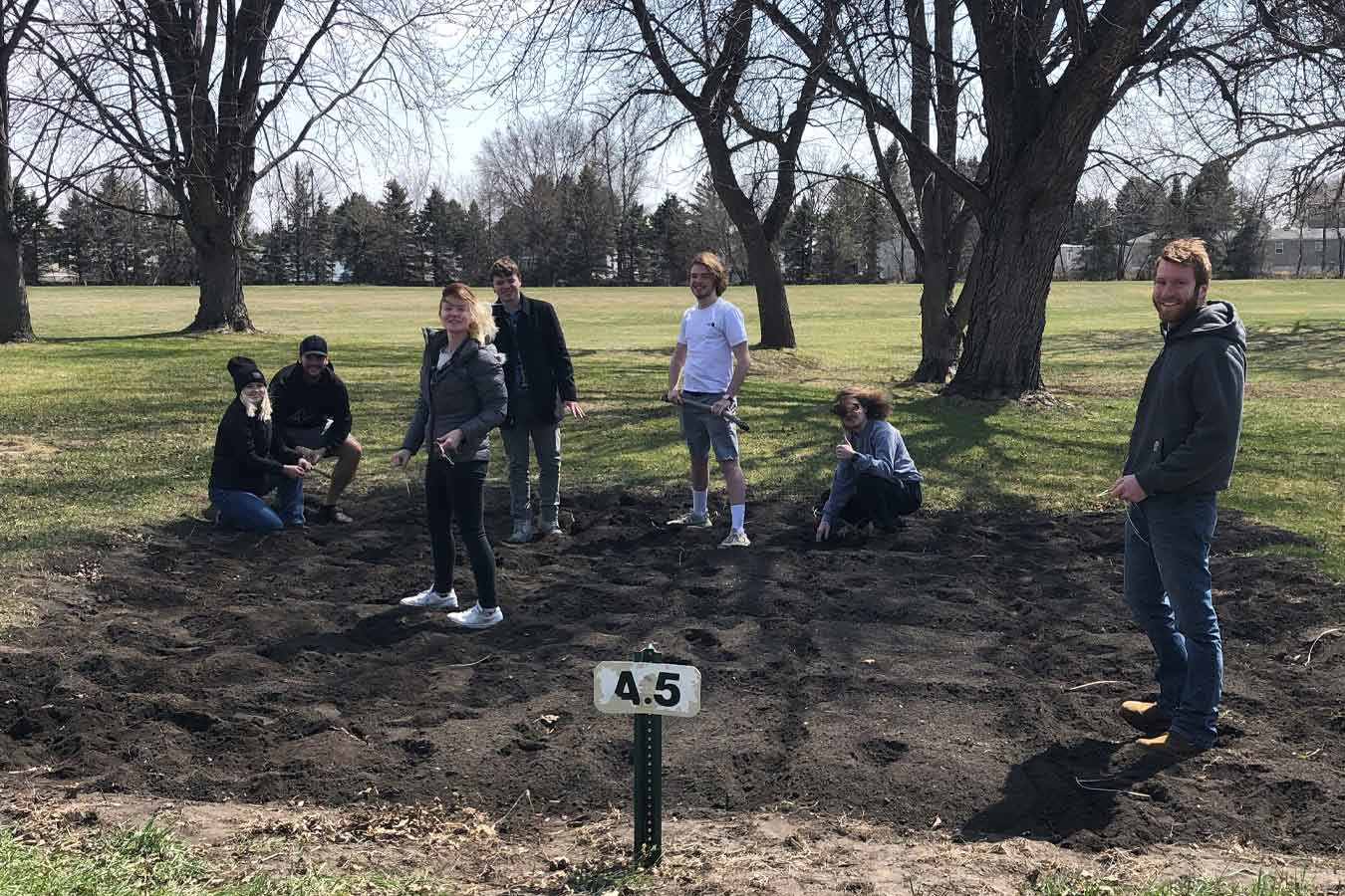 Gardening Club planting potatoes