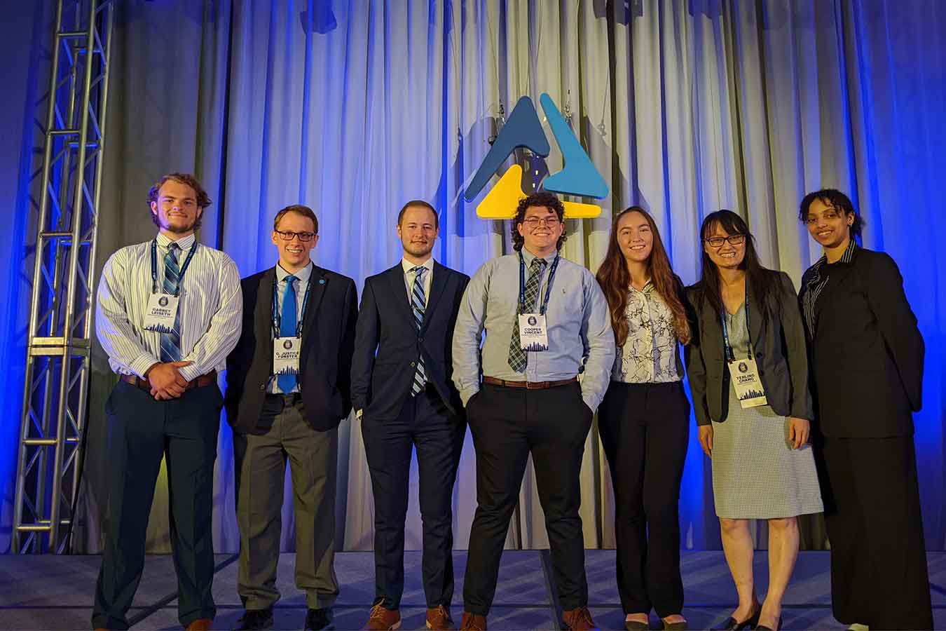 FBLA competitors at National FBLA Competition. Pictured (l-to-r): Garrett Leiseth, Justice Forster, Jacob Stricherz, Cooper Vincent, Kalani Mangin, Advisor Dr. Yenling Chang, and Ephrata Yared Feyissa.