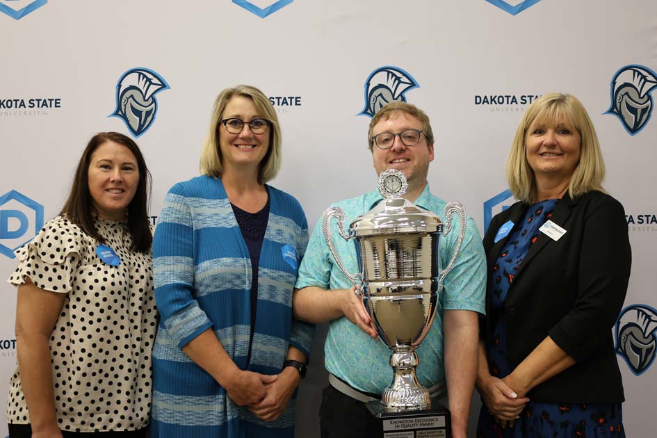 Brenda Merkel, Wendy Simmermon, Matthew Ingram, and Deb Roach collaborated on a supervisor training program which was awarded the 2023 Knowlton Excellence in Quality award at DSU. Not pictured is Mike Roach.