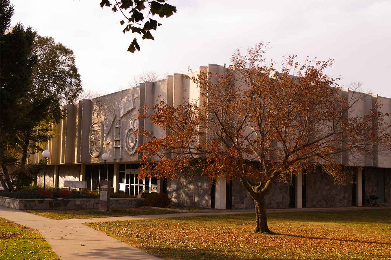 Fall photo of campus featuring the Karl Mundt Library.